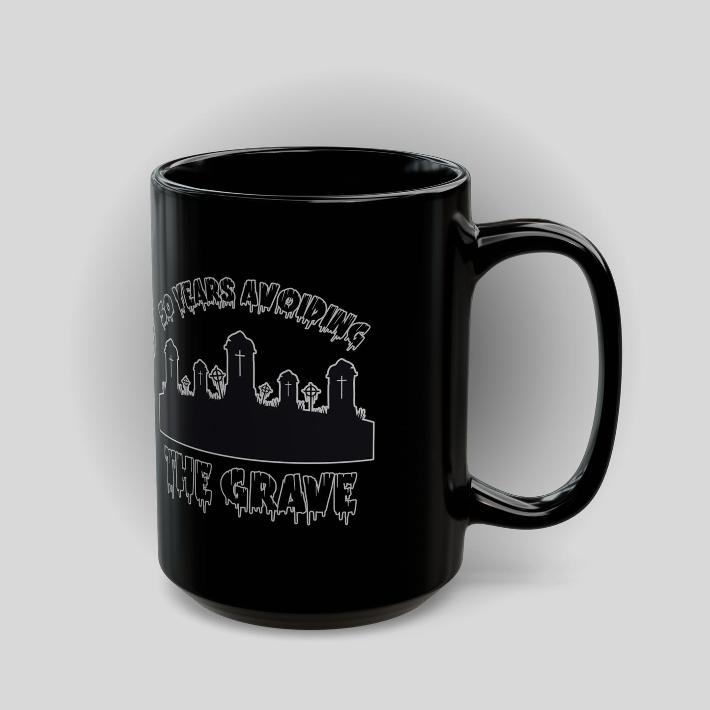 Black Mug — "50 Years Avoiding the Grave" Gothic Cemetery Coffee Cup