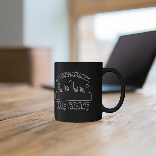 Black Mug — "50 Years Avoiding the Grave" Gothic Cemetery Coffee Cup